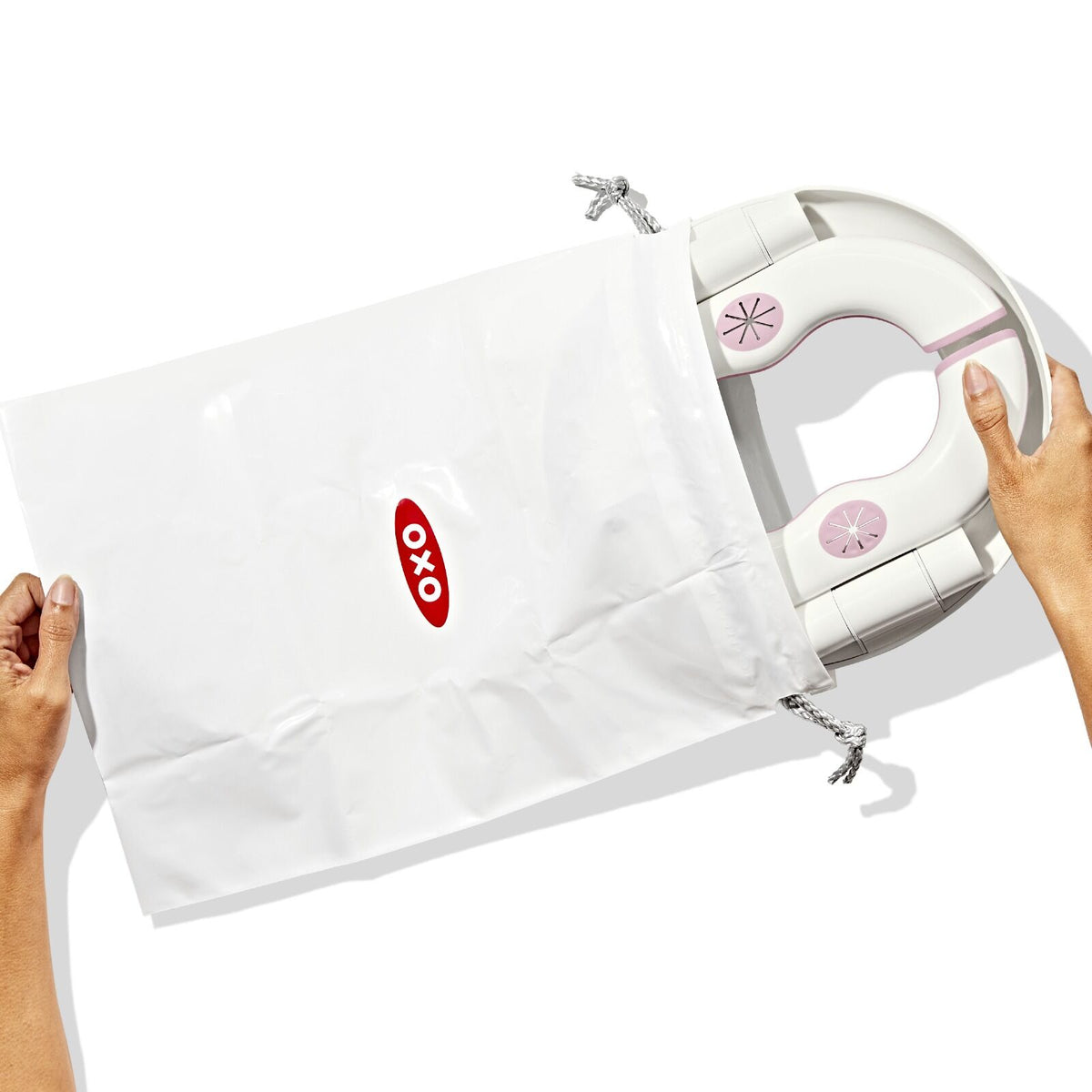 oxo-tot-2-in-1-go-potty-blossom-x5 tot_63172200_2in1-go-potty-blossom_pdp_01.jpeg