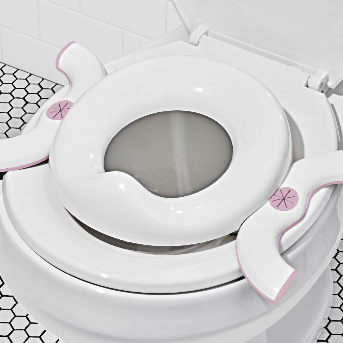 oxo-tot-2-in-1-go-potty-blossom-x5 tot_63172200_2in1-go-potty-blossom_pdp_03.jpeg